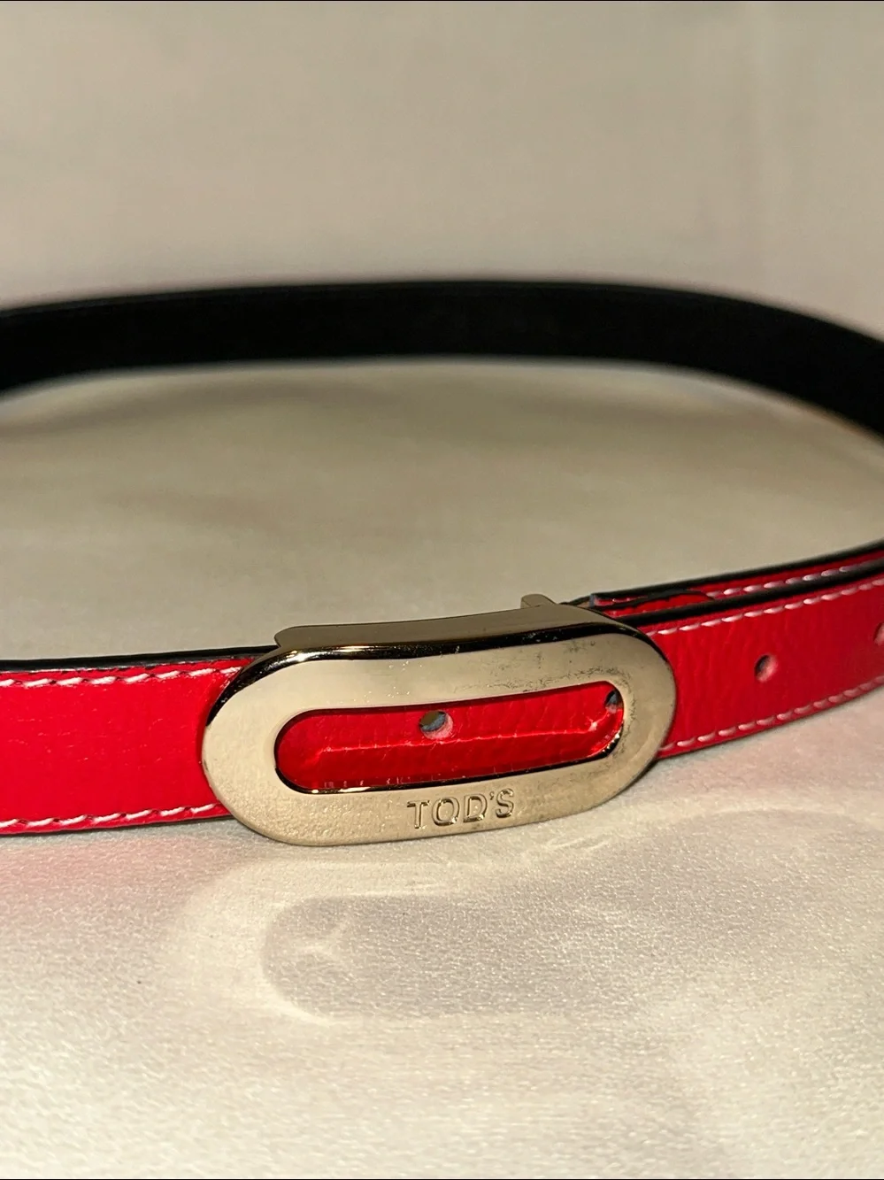 Tod's True Red Leather Belt with Silver Logo Engraved Buckle & White Stitching